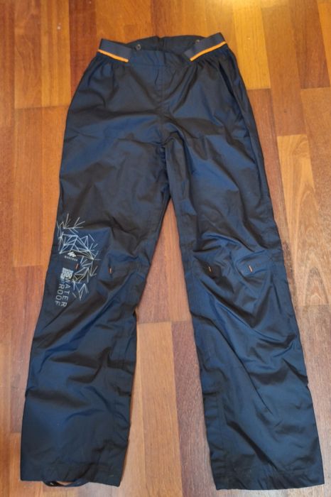 Spodnie przeciwdeszczowe dziecięce Quechua rozmiar 131-140