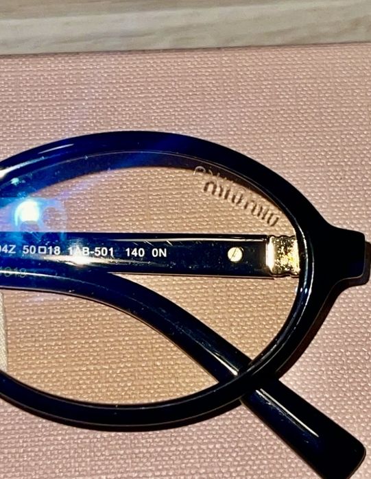 Okulary Miu Miu old money czarny