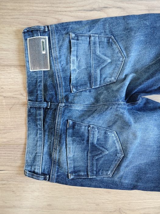 Damskie spodnie Diesel rozmiar E27 L32