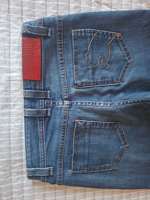 Dżinsy jeansy Puma ciemnoniebieskie 26/32