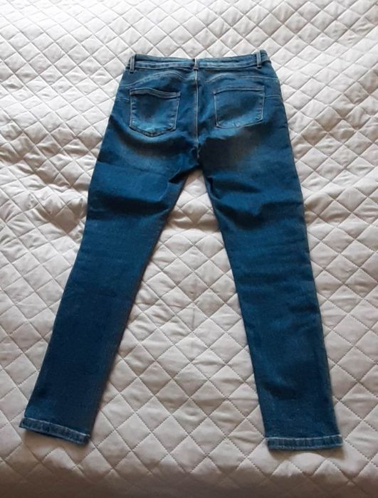 Jeansy jak nowe 31