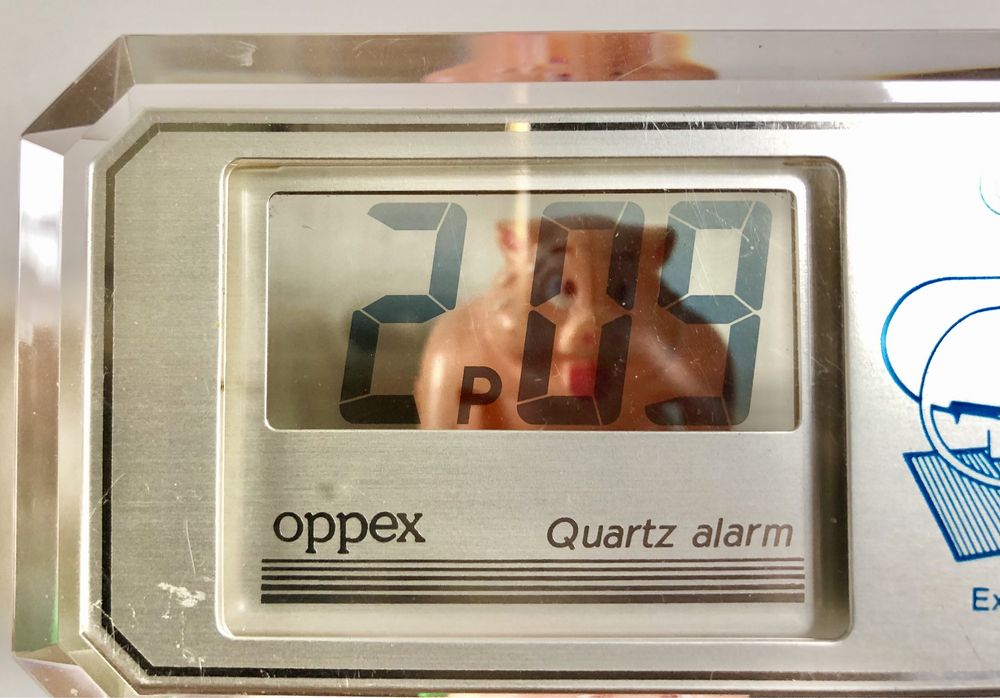 Retro zegarek budzik LCD kwarcowy Oppex reklama OTIS przeźroczysty vtg