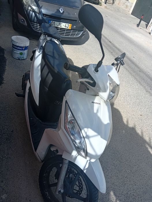 Vision 110cc + capacete