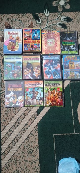 Диски з мультфільмами фільмами іграми