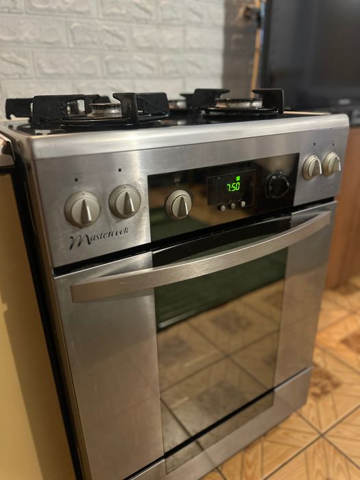 Газова плита з електричною духовкою  «Mastercook”