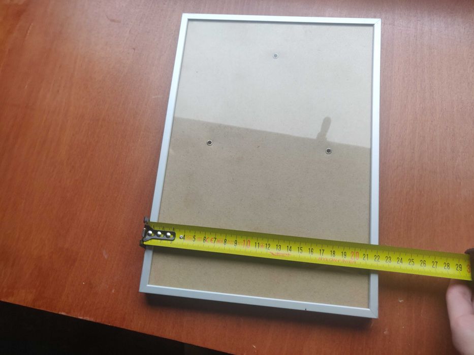 Moldura com aro metalico