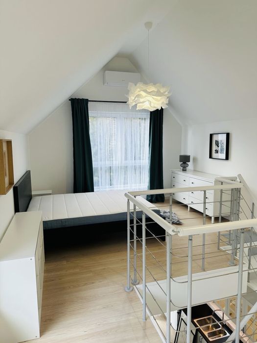 Nowe dwupoziomowe mieszkanie   z patio i ogrodem