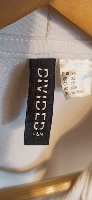 Sprzedam dresową, dziewczęcą,sportową  białą kamizelkę H & M