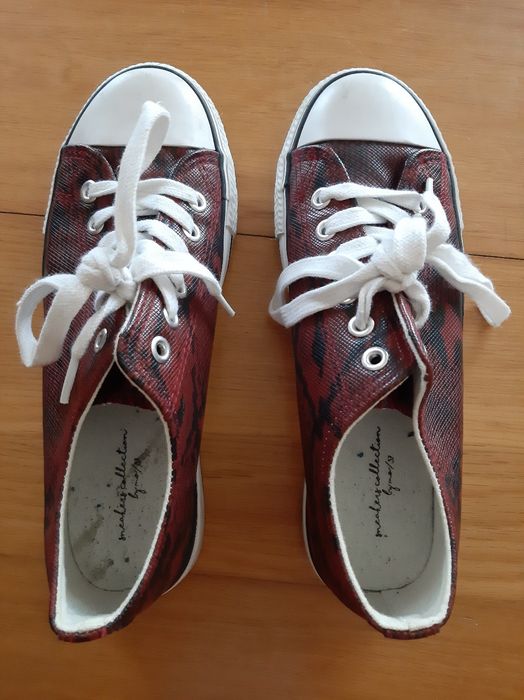 Ténis em pele com efeito cobra