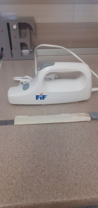 Электро нож немецкой фирмы FIF. Новый.  Очень нужная вещь для дома
