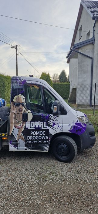 Pomoc Drogowa Holowanie Transport Wymiana koła Odpalanie samochodów
