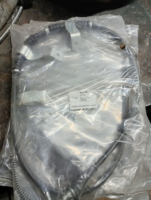 Трос ручного тормоза Шевроле Лачетти