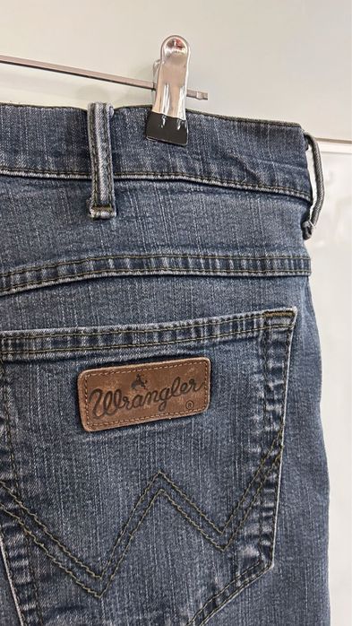 Granatowe meskie spodnie jeansowe jeansy Wrangler W36 L34