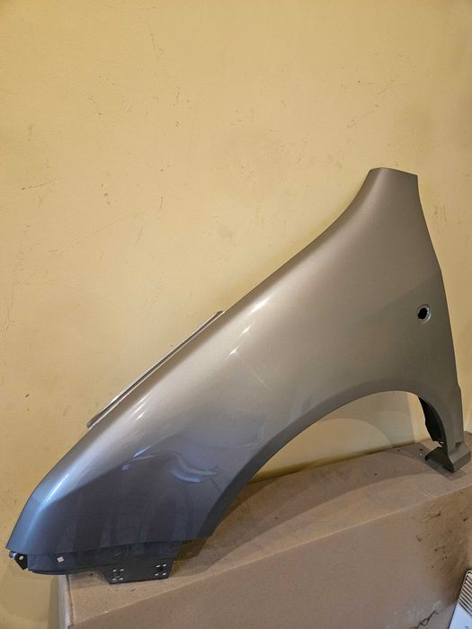 Fabia I błotnik 9202 lewy ocynk nowy