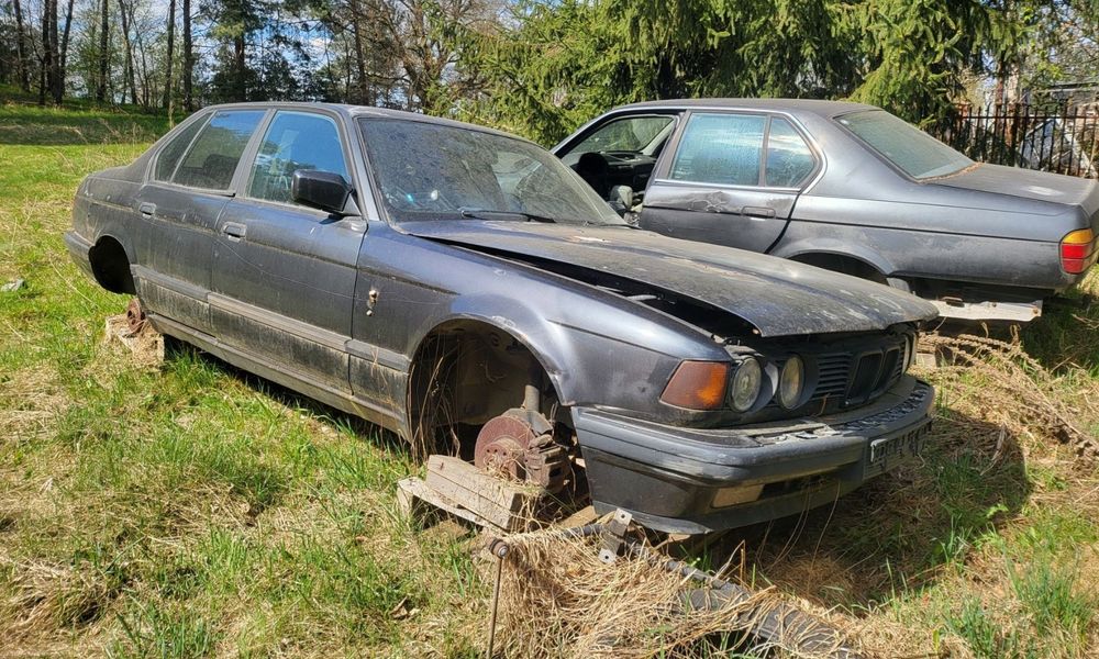 Bmw e32 blotnik prawy , lewy 735