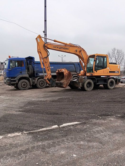 Usługi | Roboty ziemne | Koparka kołowa | Wywrotki 4-osiowe |