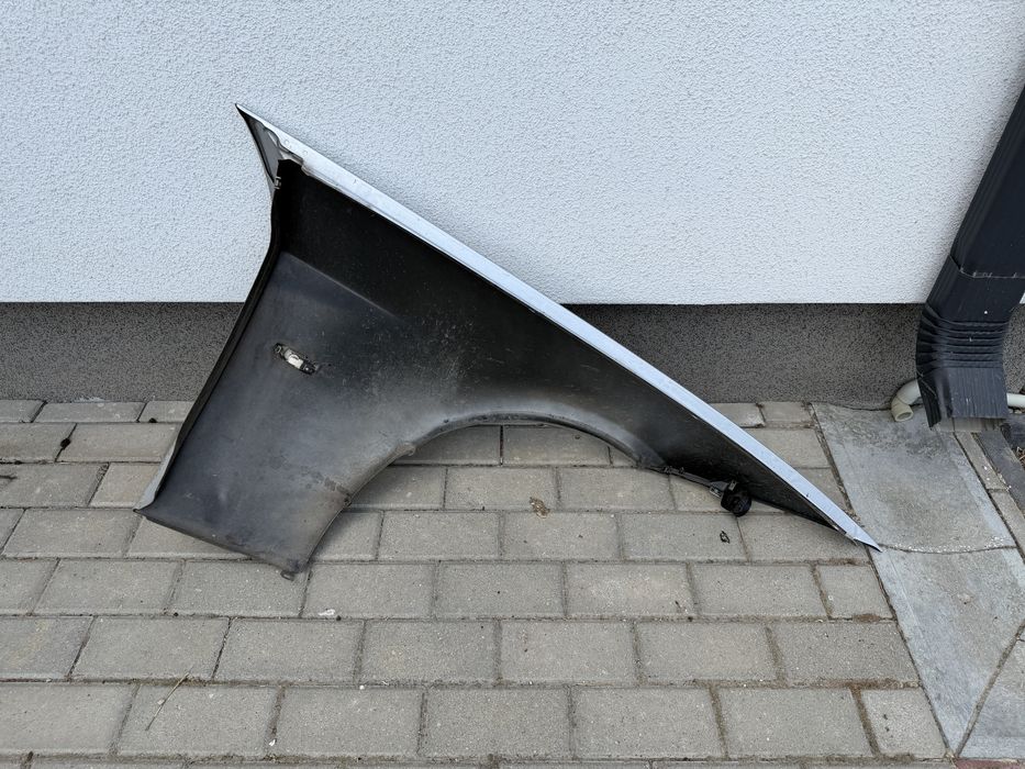 Błotnik przedni lewy BMW E91