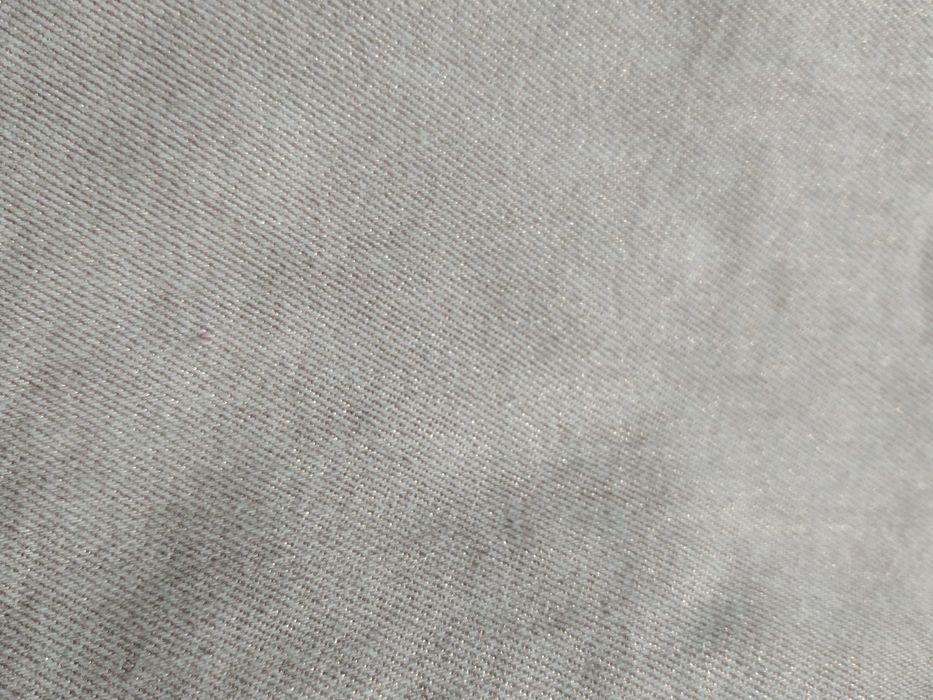 Pastelowo-różowe spodnie z perłowym połyskiem rozm. 128
