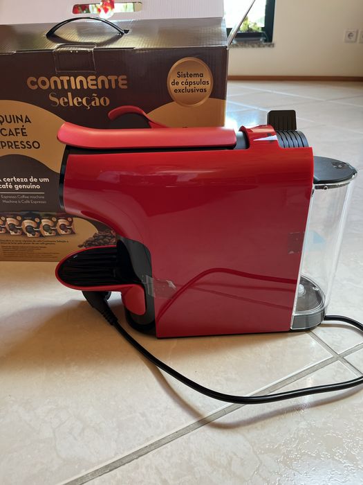 Maquina de café da marca Continente.
