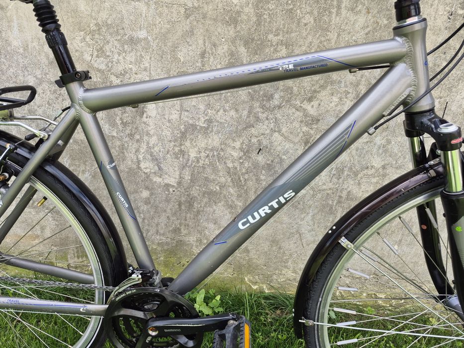 Rower Curtis Shimano XT LX 3x9 Trekking Aluminium Suntour Bagażnik