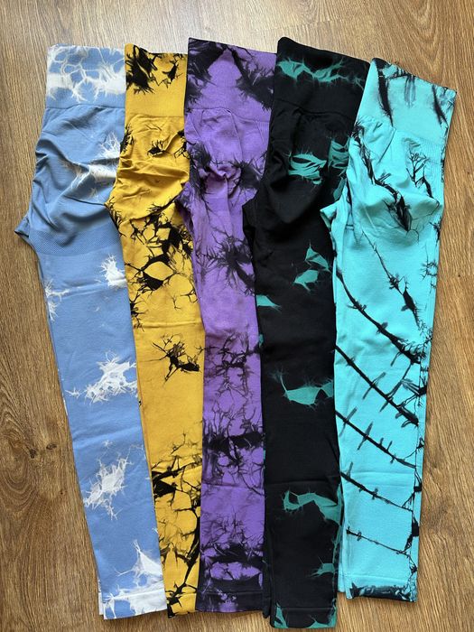 Спортивні комбінезони,лосіни,топи,шорти