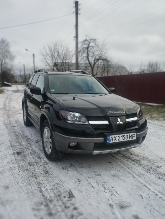 Аутлендер 2.4 бензин