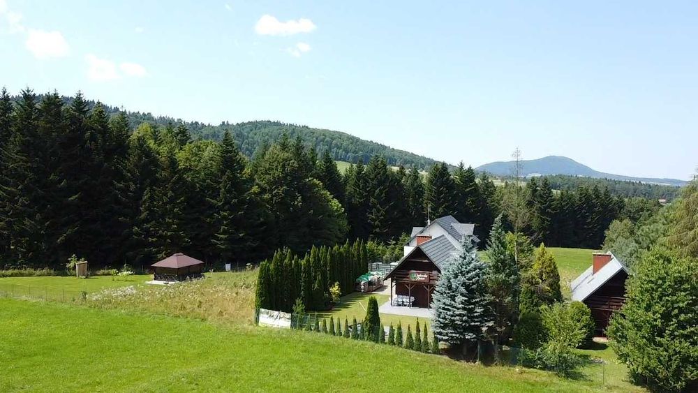 dochodowa działka z całorocznym domem do wynajęcia (Booking)