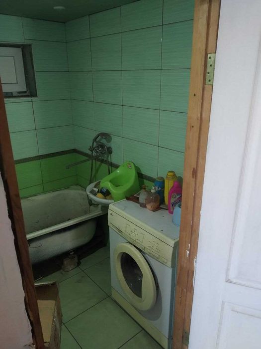 Продажа дома в общем дворе.
