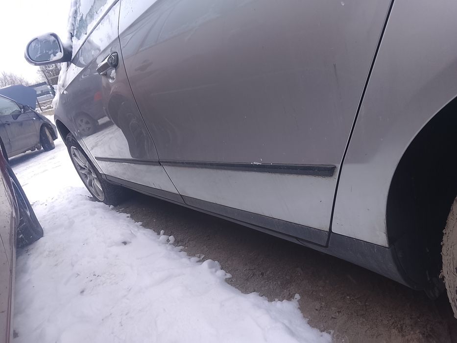 Drzwi lewe passat B6 srebrne