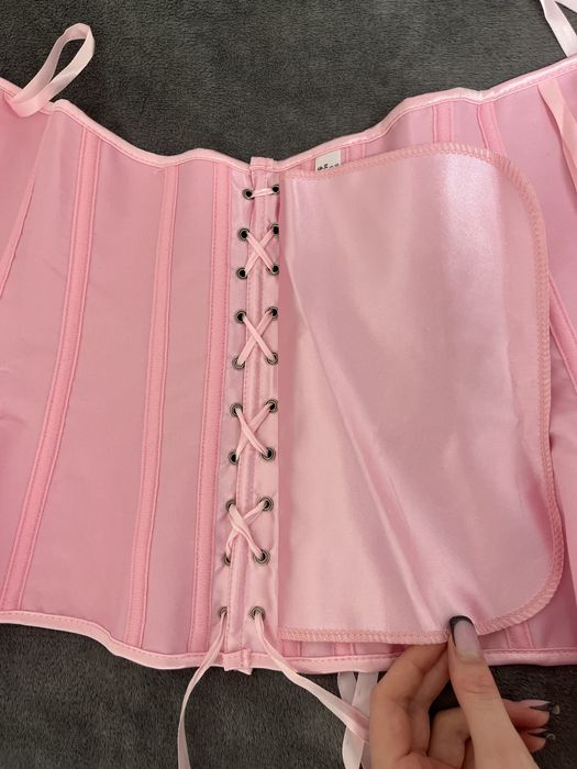 Рожевий жіночий корсет