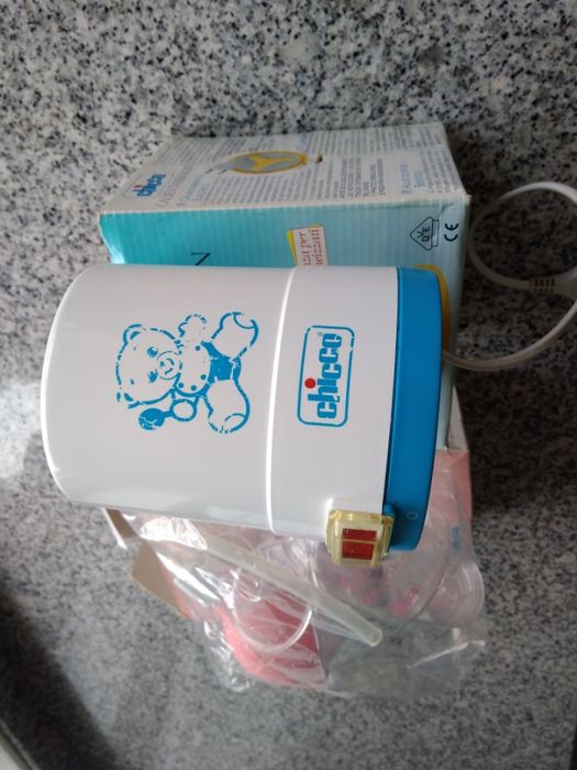Aquecedor de biberões e bomba de tirar leite