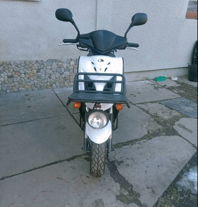 Продам скутер кумко kymсo