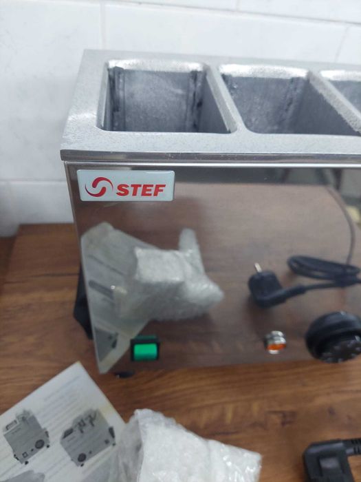 Aquecedor de pacotes de leite industrial