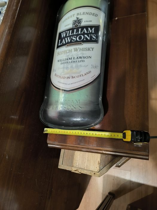 Publicidade luminosa garrafa William Lawson's
