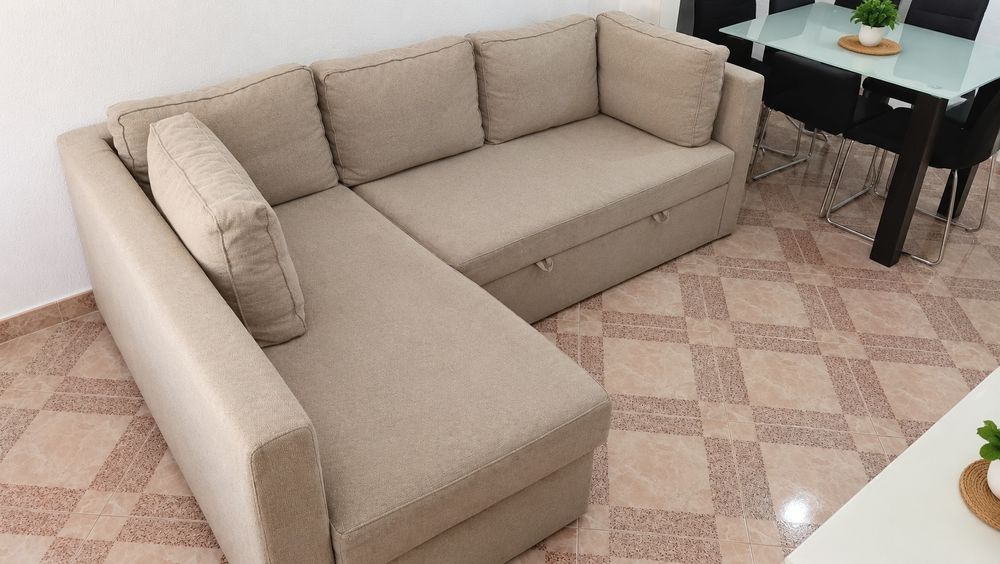 Sofá de canto com cama e baú