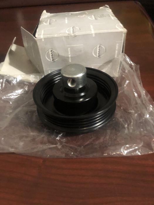 1192577A13 Nissan ролик натяжителя приводного ремня