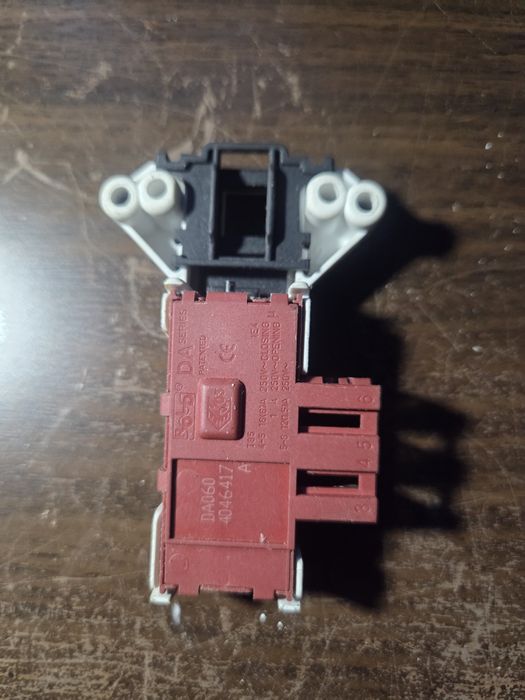 Blokada drzwi pralki Amica DA060