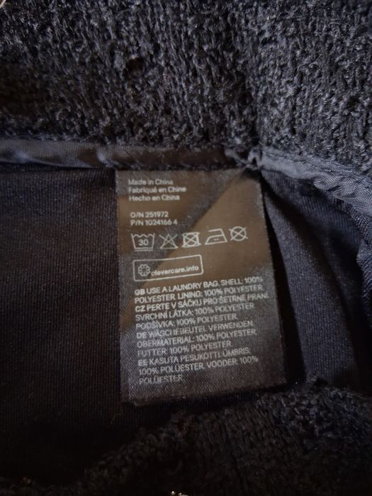 Saia em tweed preta da H&M
