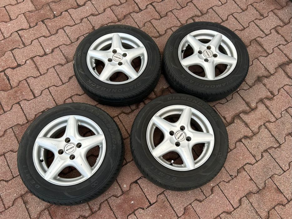 Koła aluminiowe felgi z oponami enzo r14 4x100