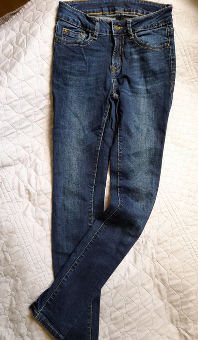 Ciemne grubsze jeansy Amisu S 36