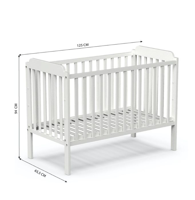 Cama de grades e colchão com Oferta de roupa de cama.