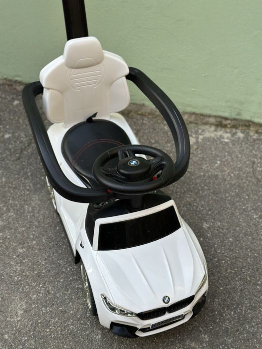 Детский толокар БМВ машинка каталка с родительской ручкой с музыкой