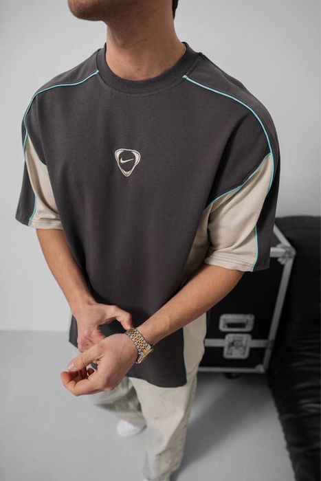 The Nike T-shirt is new and has never been worn.