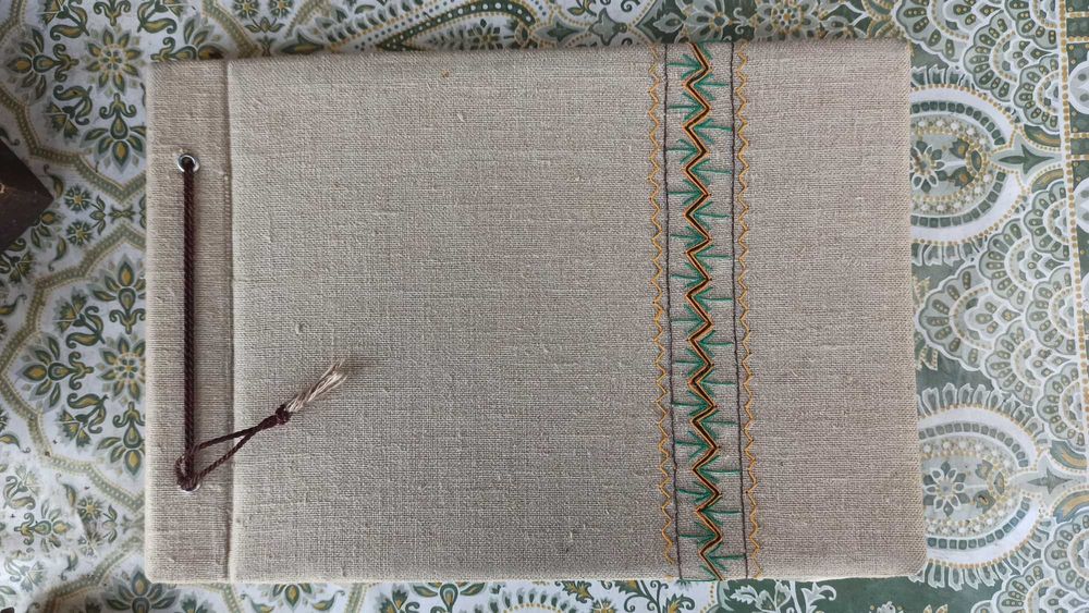 Stary ok 70-cio letni album na zdjęcia obszyty płótnem lnianym