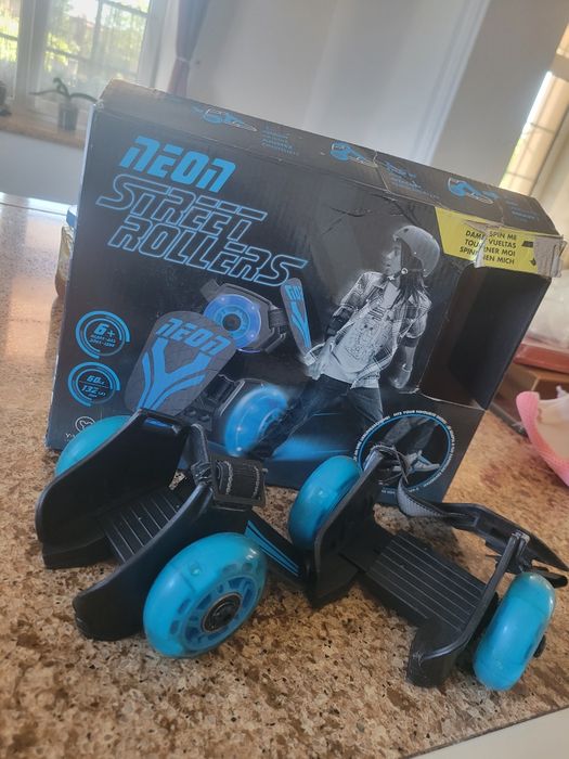 Роликовые коньки