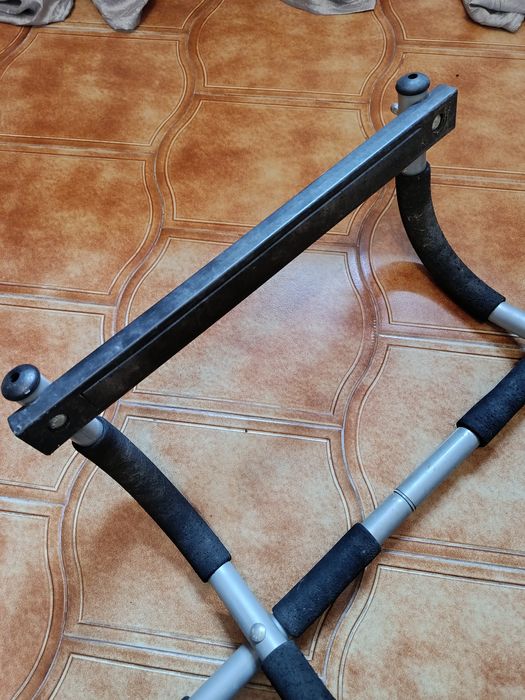 Barra de elevação para porta