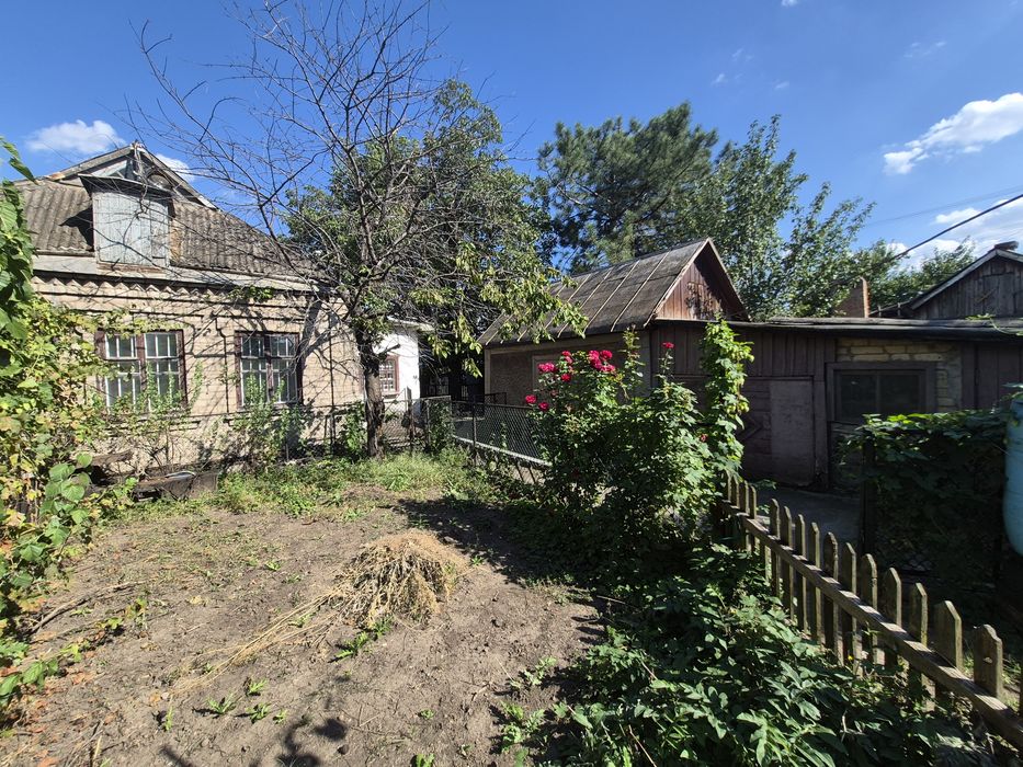 Продам 4х кімнатний будинок з гаражем/ Довгинцево