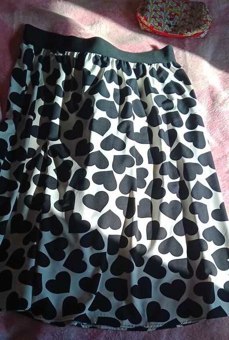 Saias e vestido novos