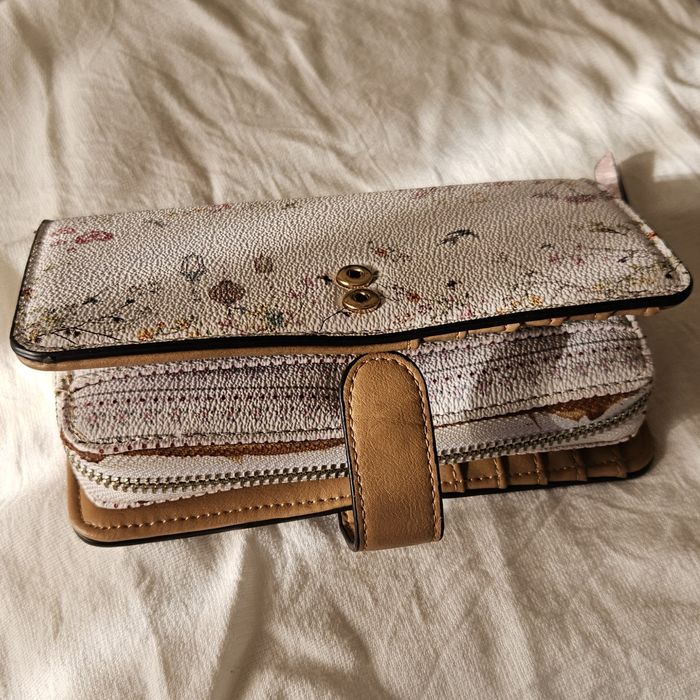 Carteira parfois (entrega em mão)