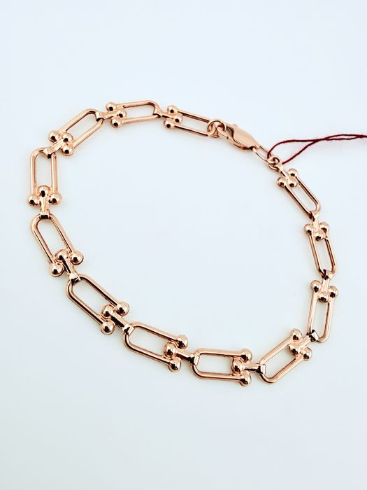 Золоті браслети нові